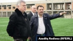 Azerbaijan - Hafiz Mammadov of Baghlan Group shows Baku Football Club stadium to minister Ziya Mammadov